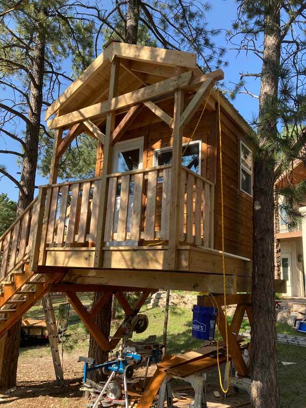 Treehouse braces attached to the trees