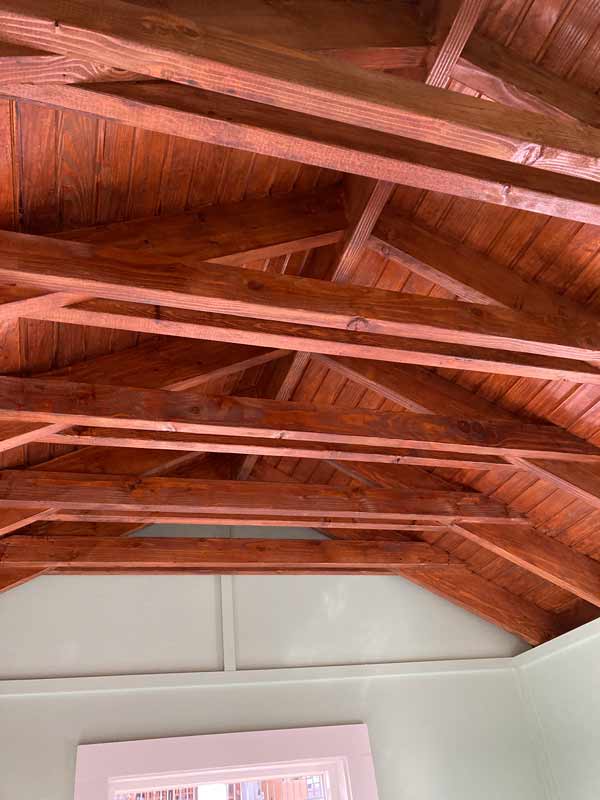 Ceiling beams are stained a warm color